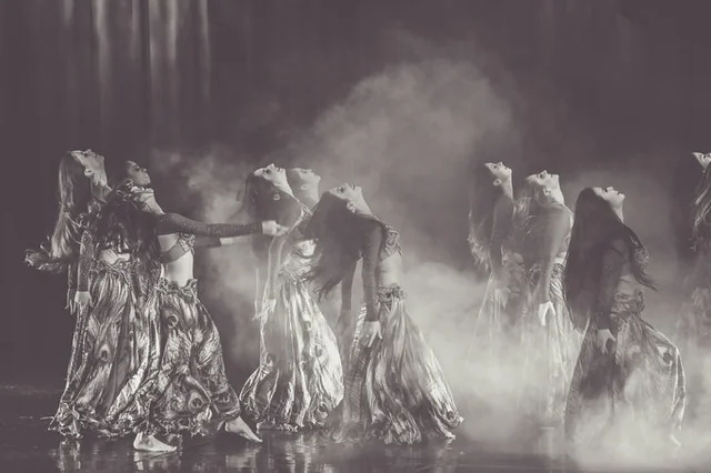 Adults learning belly dance at a weekly class in Bournemouth
