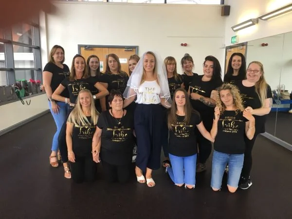 Britney hen party dance class Bournemouth group mid-routine